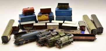 Twenty-four mainly Hornby Dublo 00 gauge model railway locomotives, wagons, vans, coaches and