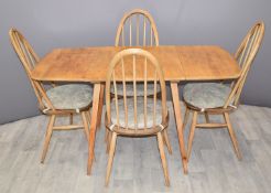 Ercol light elm fall flap dining table and four chairs, maximum width 136cm x D74 x H72cm
