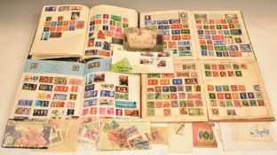 GB and world stamp collection in four albums and loose