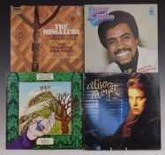 Approximately 100 albums of mixed genres