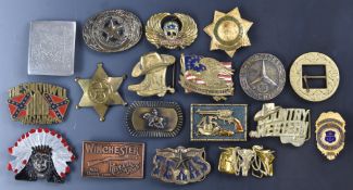 Eighteen mainly American novelty and police related belt buckles including Winchester Repeating