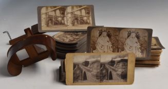 Victorian or early 20thC stereoscopic viewer together with approximately 100 cards, including