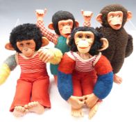 Four Jacko monkey bears, largest 50cm tall.