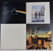 Pink Floyd - Five albums comprising Dark Side Of The Moon (two posters, two stickers), Wish You Were