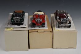 Three Franklin Mint diecast model cars comprising Duesenberg J Derham Tourer 1930, Alvis 4.3 Litre