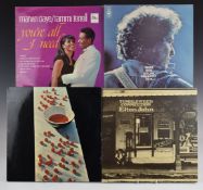 Approximately 70 albums including Elton John, Simon and Garfunkel, The Rolling Stones, Carole