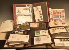 A large GB and world stamp collection including first day covers and covers, in fourteen volumes