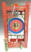 A large Meccano mechanical wall clock, 73 x 37 x 22cm.