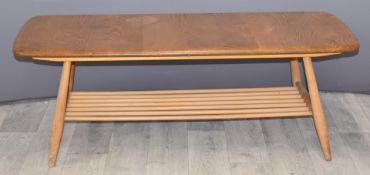 Ercol light elm coffee table with rack below, L105 x D46 x H36cm