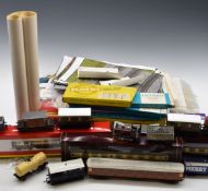 A collection of 00 gauge rolling stock comprising six coaches, eight goods wagons and a