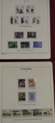 GB mint stamps collection in sixteen volumes including presentation packs and minisheets. Very