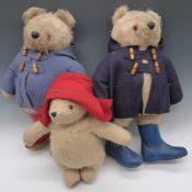 Three Gabrielle Designs Paddington Bears, largest 50 cm tall.