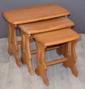 Ercol light elm nest of three tables, W56 x H42cm