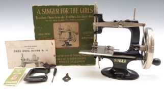 The Singer Manufacturing Company A Singer For The Girls miniature sewing machine, in original box.