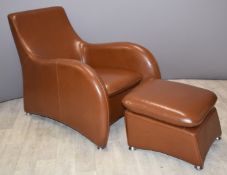 Tan faux leather Art Deco style chair and matching footstool