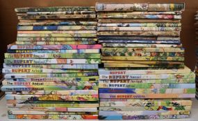 Over 50 Rupert The Bear annuals and books dating from the 1940's onwards.