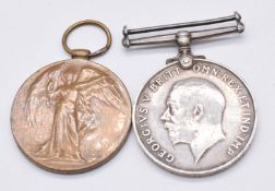 Royal Navy WW1 medal pair comprising War Medal and Victory Medal named to J93182 J Metcalfe, Boy 1