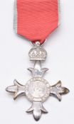 The Most Excellent Order of the British Empire MBE civilian award to Brian Chapman Frith, for