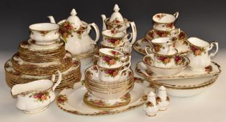 Approximately sixty three pieces of Royal Albert Old County Roses dinner and teaware including