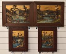 Set of four Japanese relief moulded and painted panels including Mt. Fuji or similar and lake