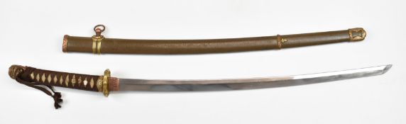 Japanese Katana Samurai sword with hammered and embossed copper kashira with applied silver family