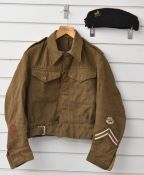 WW2 British Army battle dress blouse 1940 pattern, size 7, with Queen's Regiment shoulder titles,