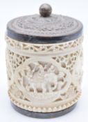 19thC Indian carved ivory silver mounted covered cache pot, the body decorated with elephants,