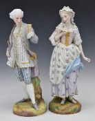 A pair of large Continental porcelain figures of sweethearts, with green anchor mark to base, H43cm