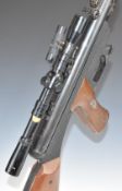 Gamo .22 air rifle with composite pistol grip and stock and Model 7 4x20 scope, serial number 769515
