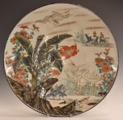 Japanese Meiji period charger with enamelled decoration of storks, flowers and foliage, 47.5cm in