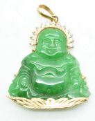 An 18ct gold pendant set with a jadeite Buddha