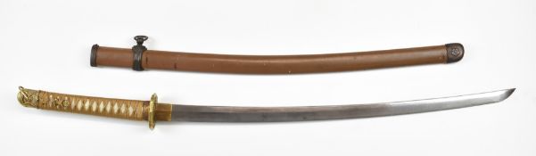 Japanese Katana Samurai sword with signed and dated blade, hammered and embossed kashira, shagreen