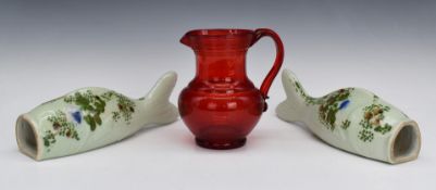 Whitefriars glass jug and a pair of Celadon glazed fish wall pockets, tallest 28cm