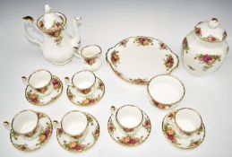Approximately sixteen pieces of Royal Albert Old Country Roses tea ware including teapot and vase,