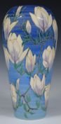 Dennis Chinaworks signed no 1 limited edition large vase decorated with magnolia against a blue