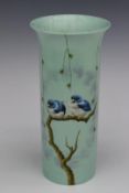Flared sleeve vase hand decorated with fledglings on a branch, signed Nixon (possibly ex Royal