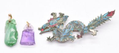 Chinese 19thC brooch set with kingfisher wing, a carved jade pendant and amethyst seal