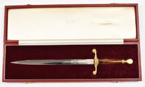 Wilkinson Sword presentation dagger with 27cm double edged blade and case. PLEASE NOTE ALL BLADED