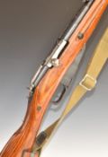 Deactivated Russian Mosin Nagant 7.62 bolt-action rifle with adjustable sights, canvas sling, top