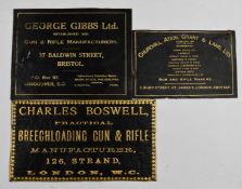 Three gilt embossed leather shotgun case labels comprising Churchill Atkin Grant & Lang Ltd, Charles