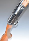 Luigi Franchi 12 bore five-shot semi-automatic shotgun with chequered semi-pistol grip and forend,