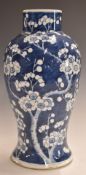 Chinese 19thC blue and white prunus vase with Kangxi character mark to base, H33cm