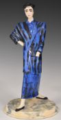 Dennis Chinaworks signed figurine from the 1980s Fashion Figurines series in blue and black