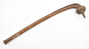 Fijian Totokia club with barbed disc head, tapered point and flared butt, 92cm long.