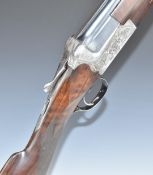 Merkel 201E 12 bore over and under ejector shotgun with engraved scenes of foxes and birds to the