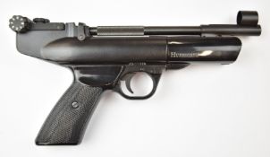 Webley Hurricane .22 target air pistol with shaped grips and adjustable sights, in original box with