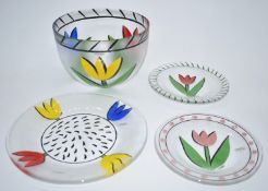Ulrica Hydman Vallien for Kosta Boda glass bowl and three dishes all decorated with flowers,