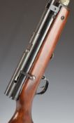 SMK XS79C .22 CO2 air rifle with semi-pistol grip and bench mount, serial number 02-88.