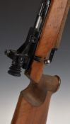 Anschutz model Match 54 .22 bolt-action target rifle with textured grip, raised cheek piece,