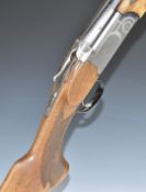 Marocchi 12 bore over and under ejector shotgun with engraved locks, top plate and underside, single